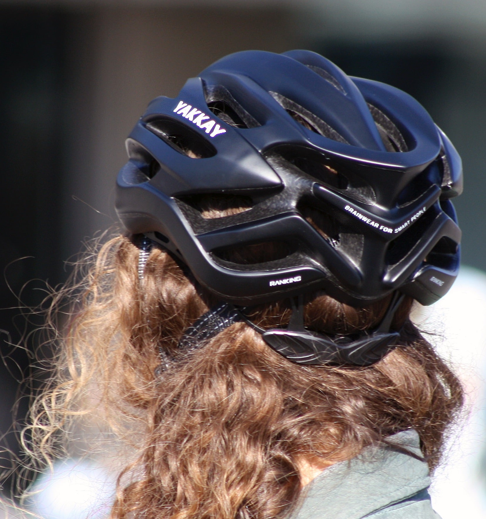 Discreet spin-dial neck adjuster for YAKKAY bike helmet.