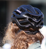 Discreet spin-dial neck adjuster for YAKKAY bike helmet.