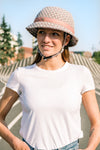 YAKKAY bicycle helmet with silver grey straps and Tokyo Rose helmet cover.