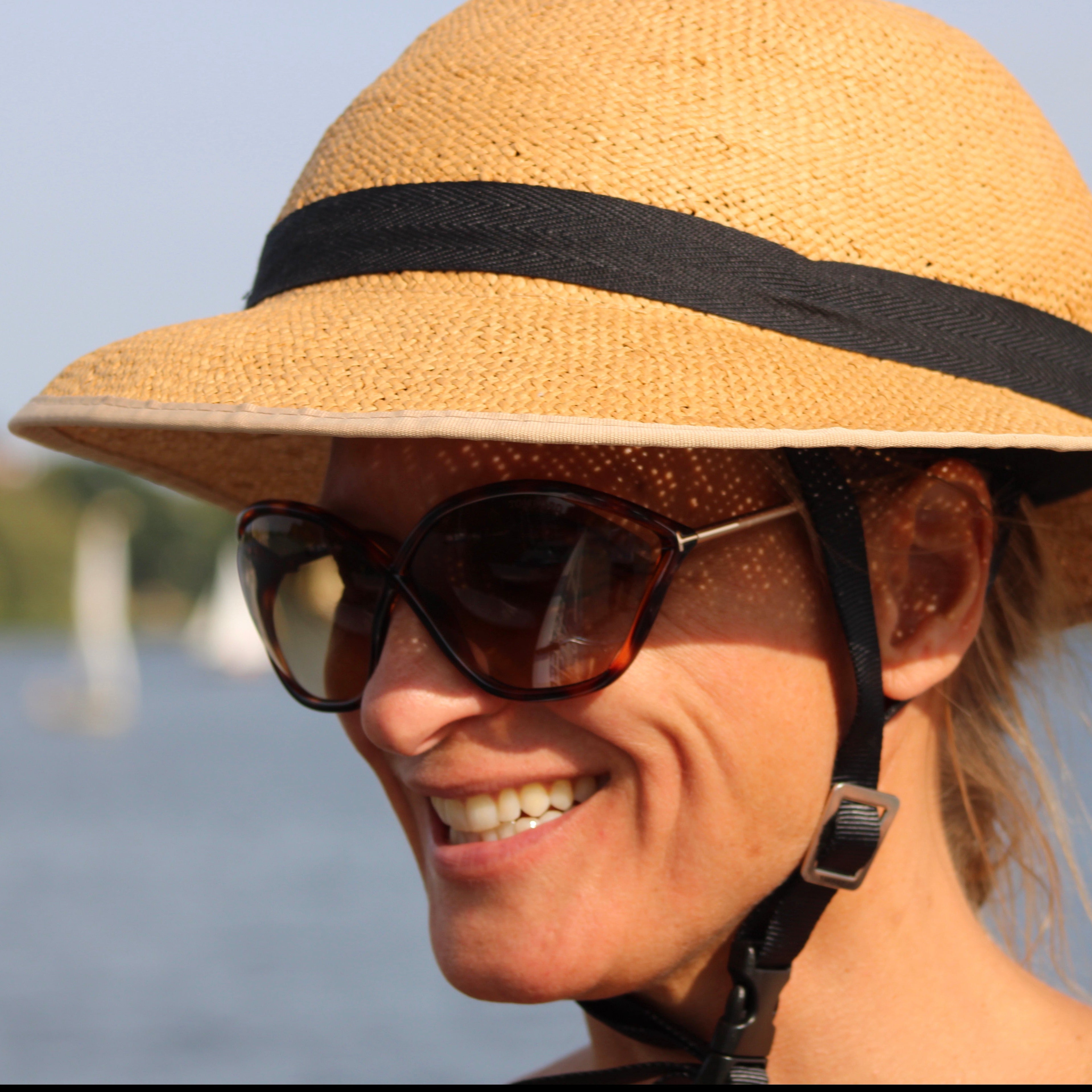 Pretty happy woman wearing big sun hat icon image Vector Image